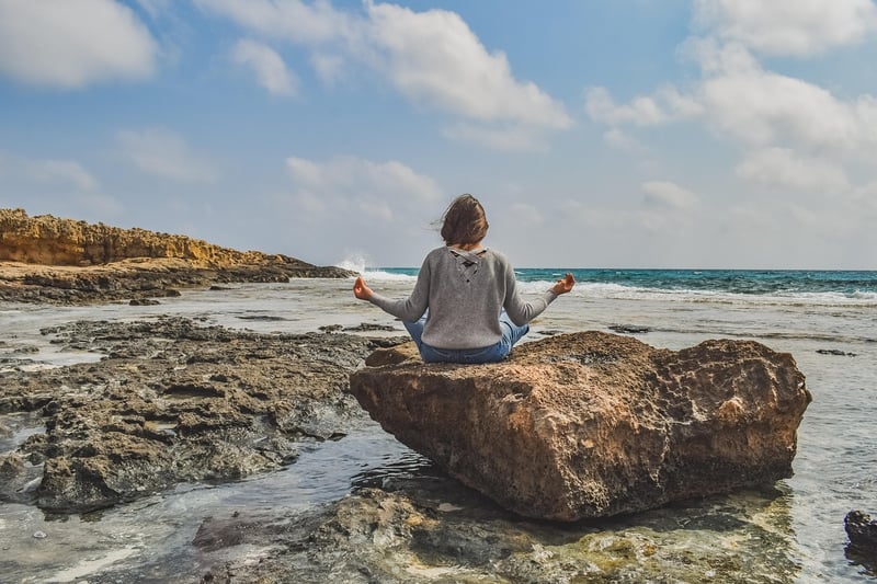 Woman meditating for focus